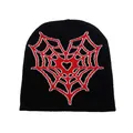 Black knit beanie featuring a striking red heart spider web pattern in a street style - Red Heart Spider Web Jacquard (Black with Red Mark)