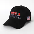 Black cotton baseball cap featuring large USA embroidery and American flag side patch - Black