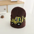 Close-up of the yellow excavator jacquard pattern on the brown knitted toddler beanie - One Size / Coffee