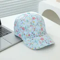 Detail of light blue baseball cap with colorful floral prints and curved brim - Head Circumference / Sky Blue