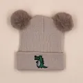 Beige knitted baby beanie with cute green crocodile embroidery and double pom-poms - 1-3 Years / Off White