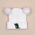 Detail of white double pom-pom knit baby hat featuring a green crocodile embroidery - 1-3 Years / White
