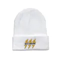 Detail of yellow embroidery with LLL and 777 text on a white knit winter beanie - One Size / White