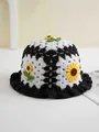 Detail of hand-crocheted sunflower bucket hat with black and white hollow knit pattern - 56-59cm / Black