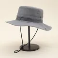 Detail of grey outdoor sun hat featuring breathable metal eyelets and ripstop fabric - Adjustable / Gray