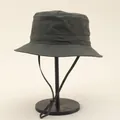 Detail of waterproof olive green bucket hat with adjustable windproof cord on metal stand - Adjustable / Green