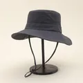 Macro detail of dark grey sun hat with adjustable windproof drawstring and metal eyelet - One Size / Gray