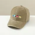 Kids khaki washed cotton baseball cap with colorful train embroidery on a studio stand - 2-6 Years (48-52cm) / Khaki
