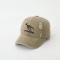 Close-up of khaki baseball cap with dinosaur skeleton embroidery and distressed vintage details - 50-54cm / Khaki