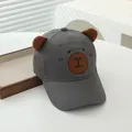Grey kids' baseball cap with brown bear ears and embroidered cartoon face detail - Adjustable Kids Size / Gray