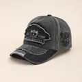 Detail of vintage New York embroidery and distressed denim texture on the baseball cap - Army Green