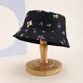 Detail of black cotton bucket hat featuring colorful mushroom and cartoon bear prints - Kids 54cm / Mushroom Style 2 Black