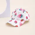 Detailed view of the strawberry and floral print pattern on a white cotton baseball cap - Kids 52-54cm / Strawberry White
