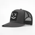 Dark grey trucker hat with smile face embroidery and black mesh back for men and women - Gray