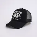 Classic black trucker hat with white B letter print and breathable mesh back panel - Adjustable / Black