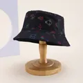 Kids black bucket hat with colorful cartoon patterns and Puppy text print on the brim - Kids 54cm / Animal Black