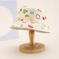 Chapeau bob enfant beige avec imprimés fruits colorés sur support en bois - Enfants 54cm / Beige Style de Fruits 2