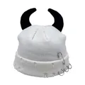 Detail of cream knit beanie with black devil horns, safety pin and punk rings - One Size / White