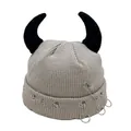Detail of grey knitted beanie with 3D horns, punk safety pins and metal ring accents - One Size / Beige