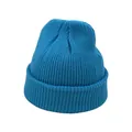 Detail of teal blue ribbed knit beanie showing texture and thick folded cuff edge - One Size / Teal
