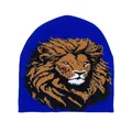 Detailed knit texture of navy blue beanie with artistic lion head jacquard pattern - Blue