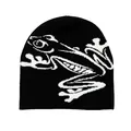 Black knitted beanie featuring white abstract frog jacquard pattern for winter casual wear - Black