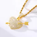 Close-up of hip-hop broken heart pendant with arrow and sparkling crystals - Heart and Arrow Gold