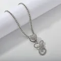 Close-up of silver tennis chain necklace with iced-out heart and cursive letter pendant - Silver Set E