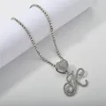 Detail of silver tennis chain with iced out heart and cursive letter K pendant - Silver Set K