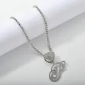 Detailed close-up of a silver-toned tennis chain with iced out cursive letter P pendant - Silver Set P