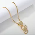 Golden tennis chain with heart link and iced-out cursive letter G pendant for women - Gold Set E
