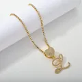 Golden tennis necklace with heart pendant and iced-out cursive letter L charm - Gold Set L