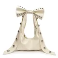 Borsa a mano bianco crema con maxi fiocco e borchie argentate in stile moto chic - Bianco