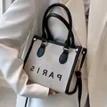 Large minimalist canvas tote bag with Paris lettering and adjustable black leather straps - Small / Black