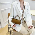 Brown cylinder crossbody bag in smooth leather with top handle and slim strap - Khaki