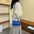 Royal blue cylinder PU leather handbag with detachable shoulder strap and top handle - Blue