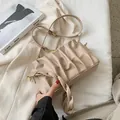 Chic beige pleated cloud crossbody bag with thin shoulder strap and metal chain - Khaki