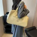 Beige canvas tote bag with black slogan print for casual fashion shoulder carry - Khaki