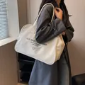Cream canvas tote bag featuring OLD HABITS DIE HARD print and rope shoulder strap - Off White