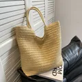 Grand sac cabas en paille tissé à la main avec doubles anses pour plage et voyages - Beige
