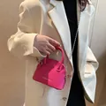Mini rose pink litchi leather handbag with gold hardware and top handle for women - Rose Pink