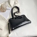 Minimalist black glossy leather underarm bag with zipper closure for women - Black
