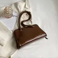 Minimalist deep brown rectangle leather underarm bag with thin straps and silver hardware - Brown