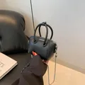 Mini black lychee leather handbag with silver chain and Fashion & Bags lettering - Black