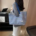 Large blue and white striped canvas tote bag for women with blue fabric shoulder strap - Blue