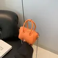 Bright orange mini crossbody bag with litchi pattern leather and silver bead chain strap - Orange