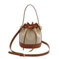 Vintage woven canvas bucket bag with brown leather trim and drawstring closure - Burlap Style / Brown