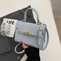 Light blue Kelly style handbag with embossed cartoon puppy and rabbit motifs - Blue Without Pendant