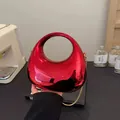 Red mirror moon-shaped acrylic handbag with gold chain strap for fashionable evening parties - Red