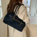 Women's black suede tote bag with long leather handles and vintage gold buckles - Black